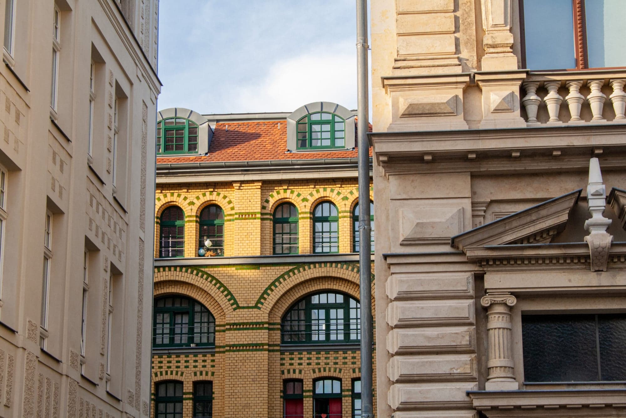 Listed façades from the Wilhelminian era (Gründerzeit) with coloured brick elements, heritage protection by an architecture practice in Wiesbaden