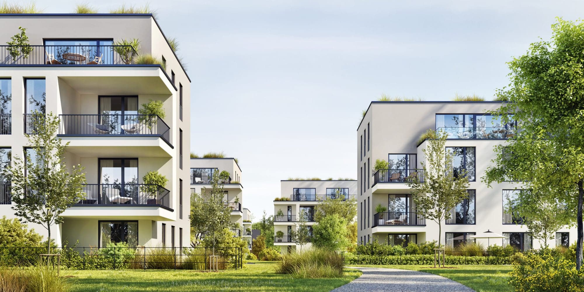 Moderne Mehrfamilienhäuser mit begrünten Fassaden und Balkonen – Neubau Architekt Wiesbaden