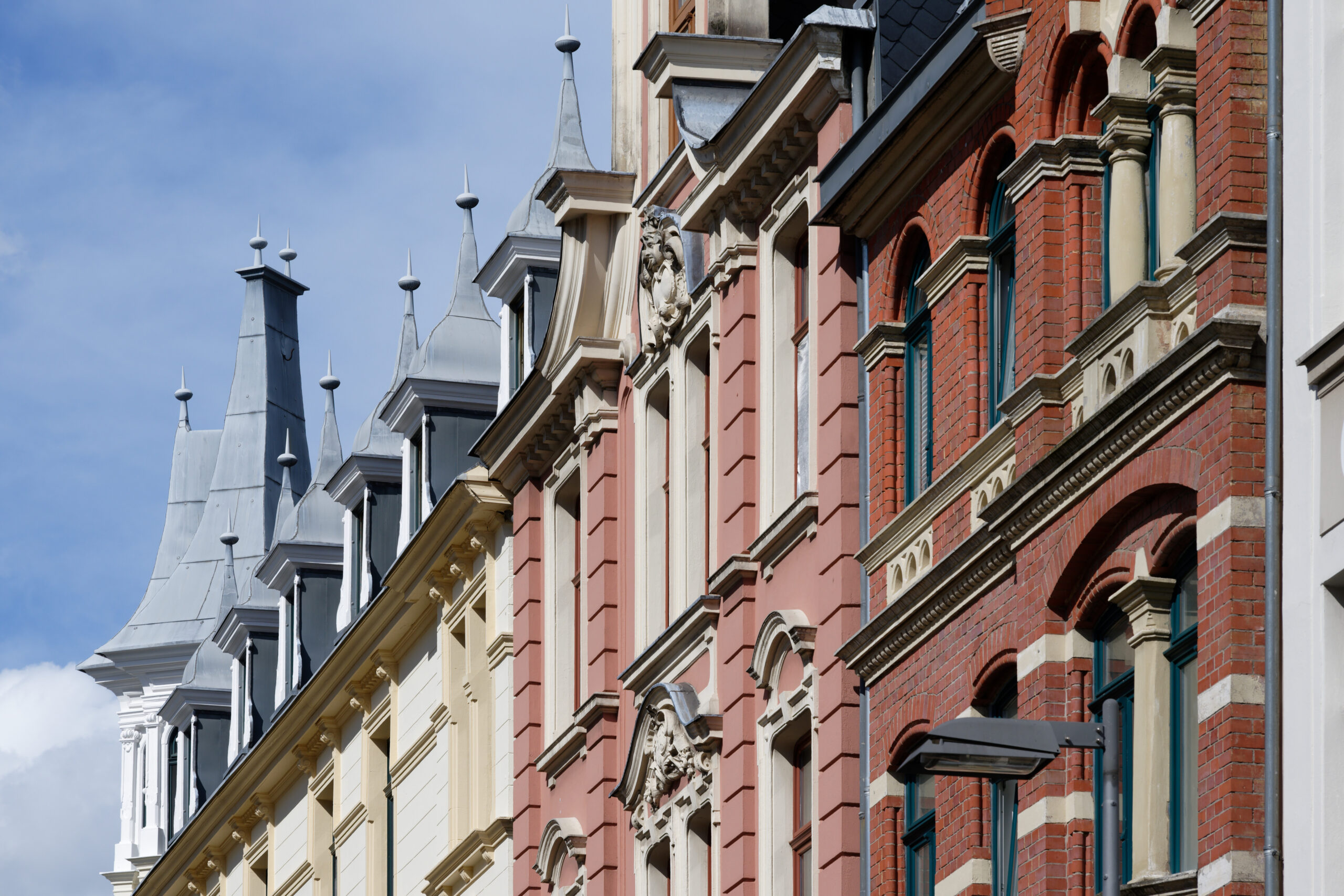 beautiful ornate pastel historicist facades with oriels and turrets from the end of the 19th century in cologne's friesenviertel district